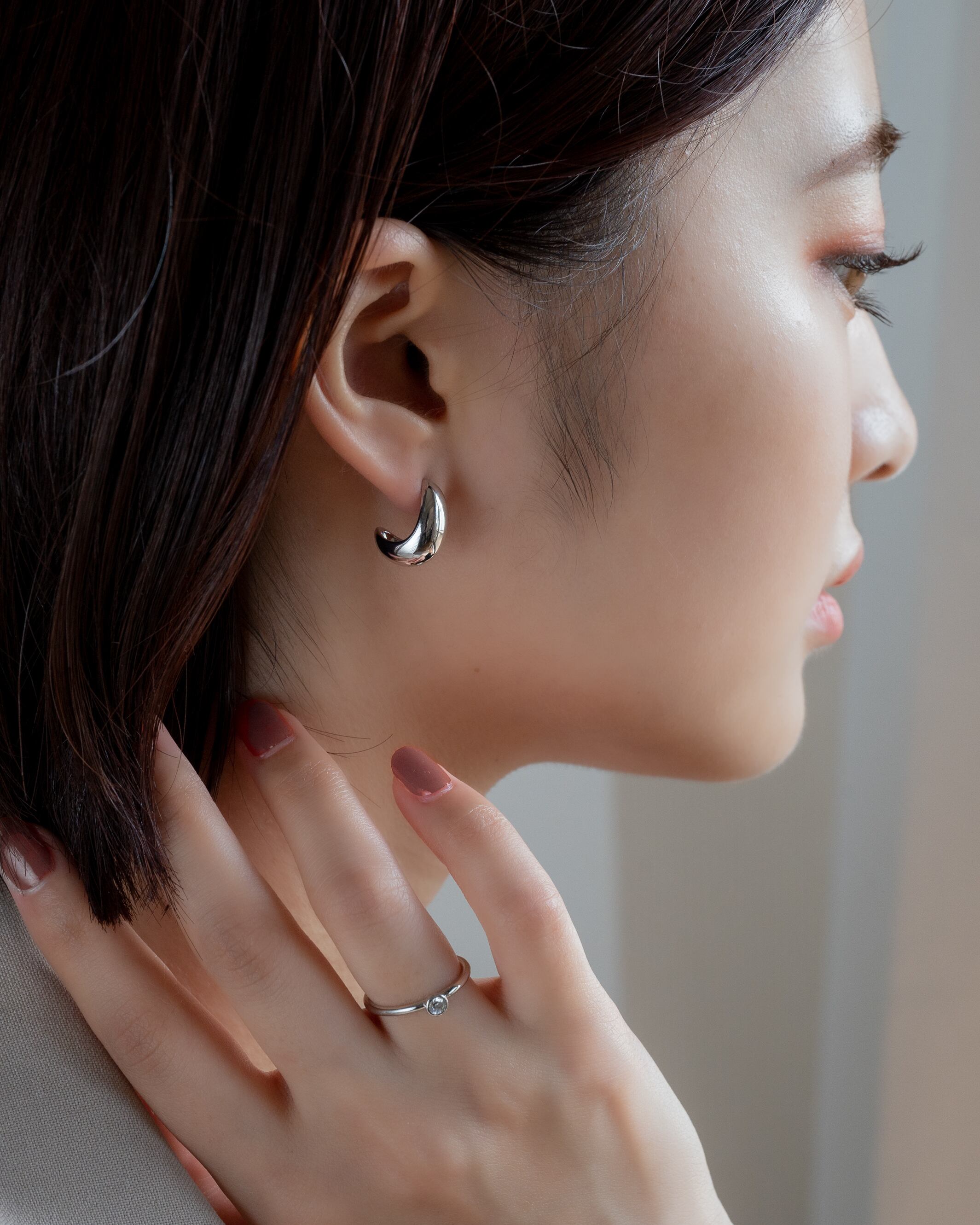 Drop curl studs earings