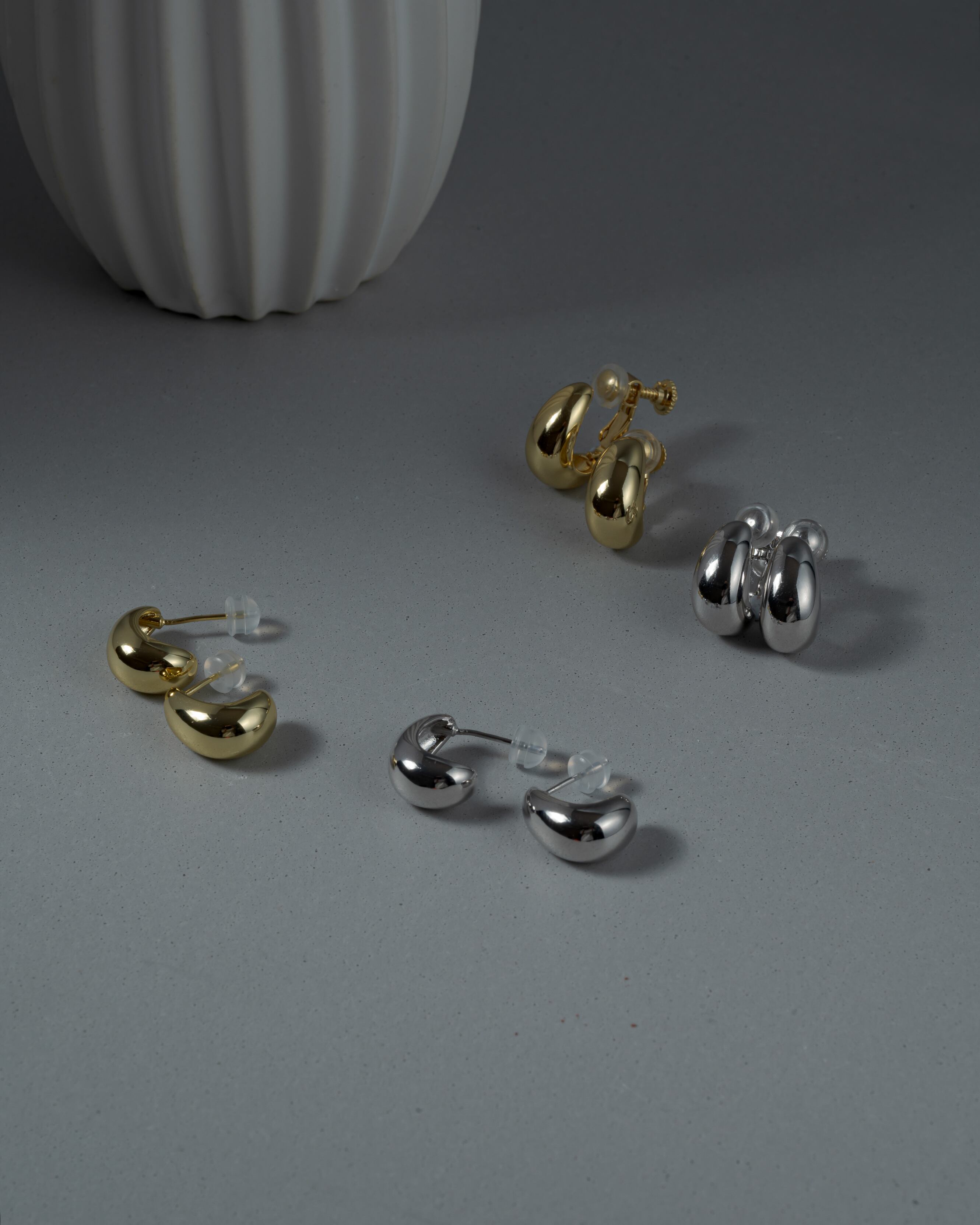 Drop curl studs earings