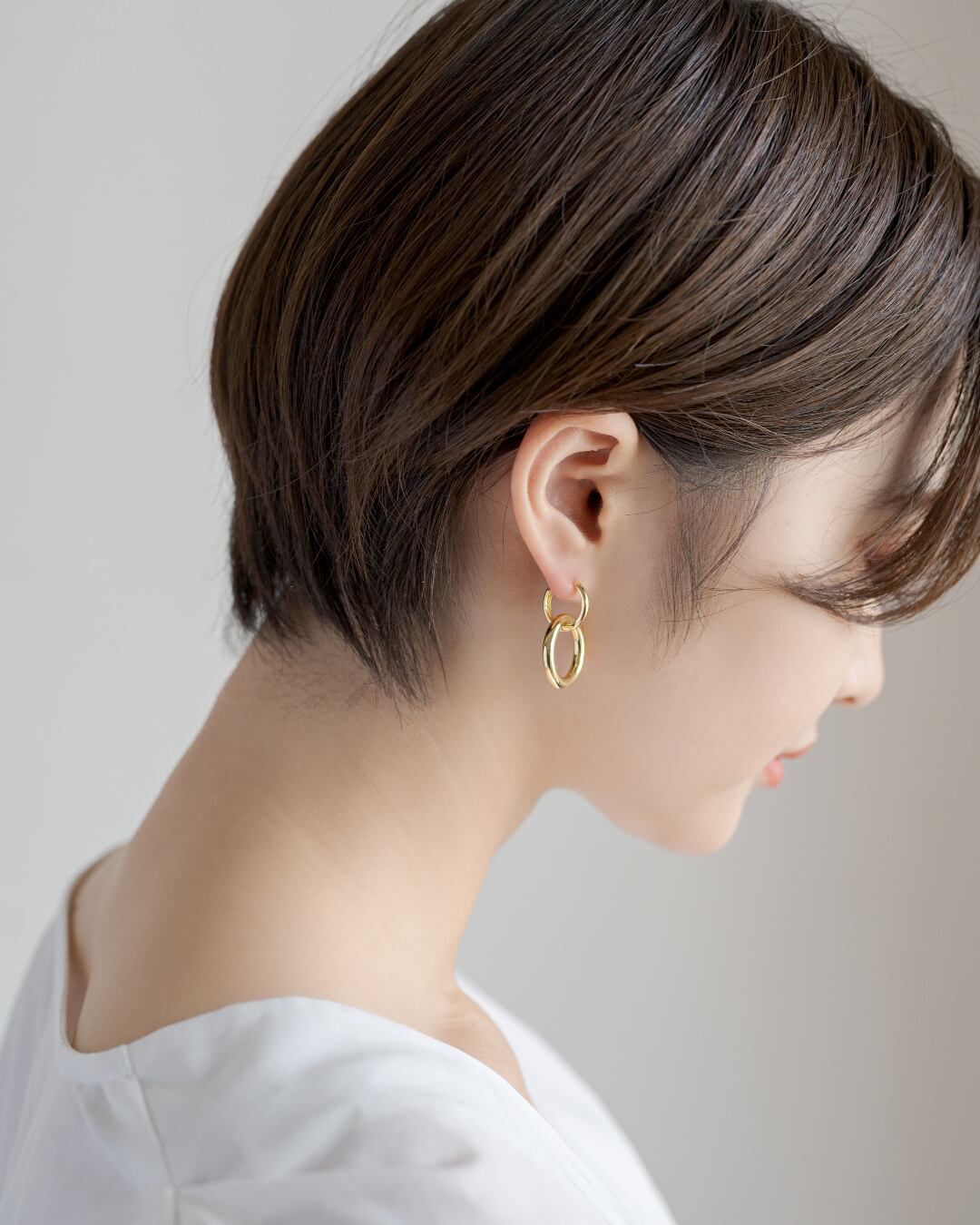 Double ring hoop pierce