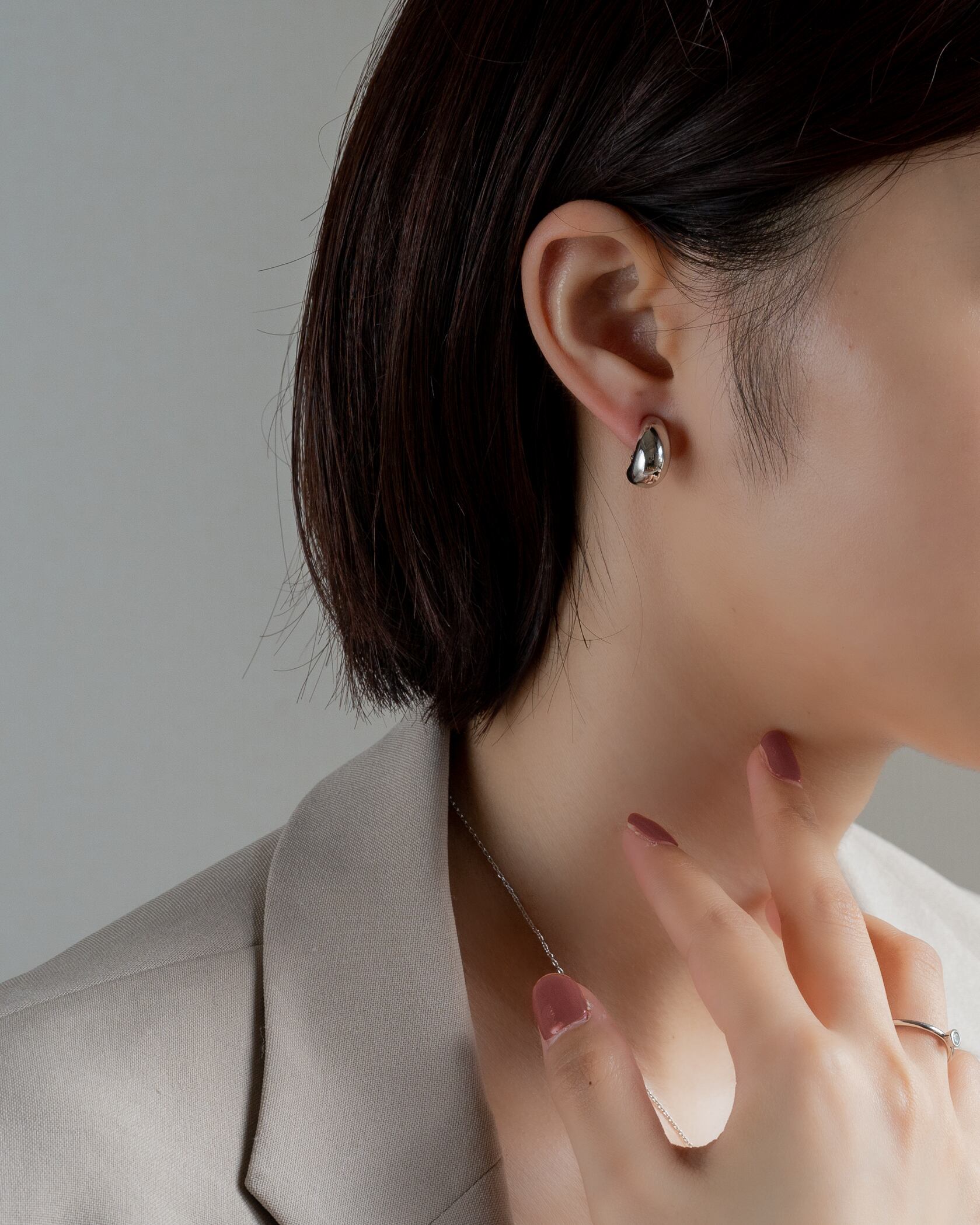 Drop curl studs earings