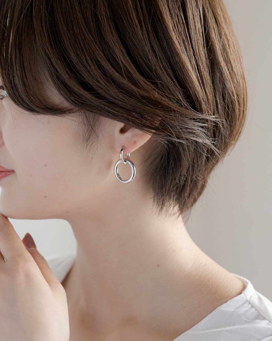 Double ring hoop pierce