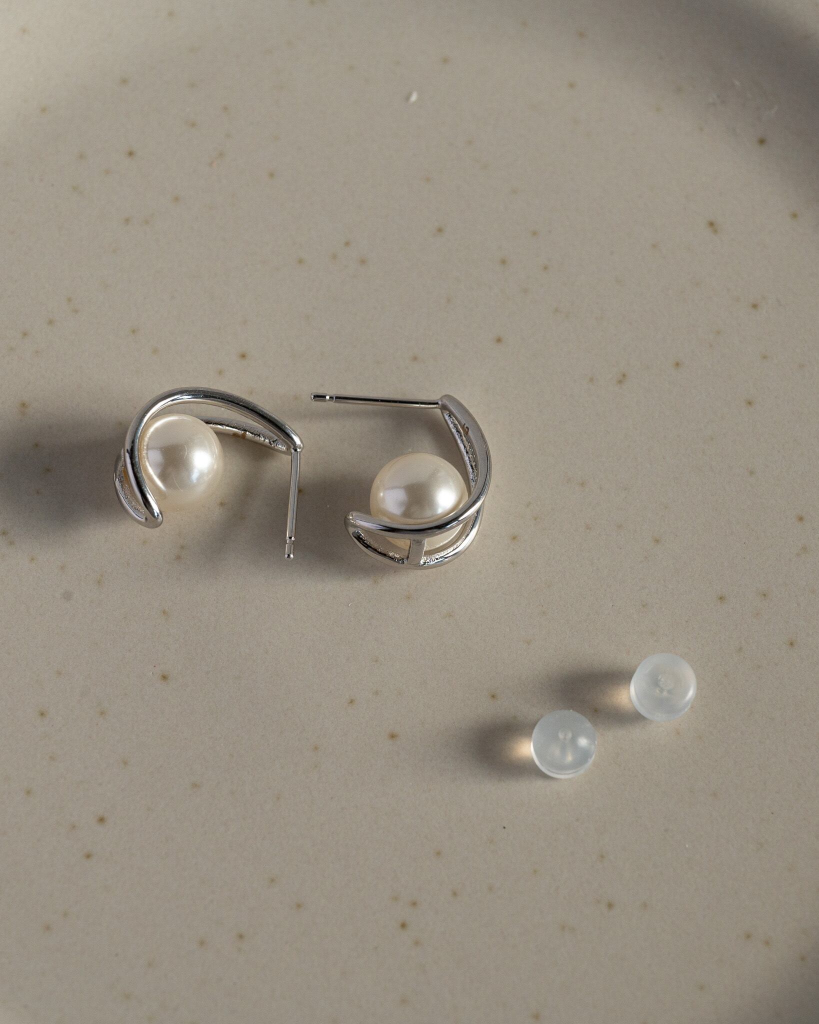 Double line pearl stud pierce