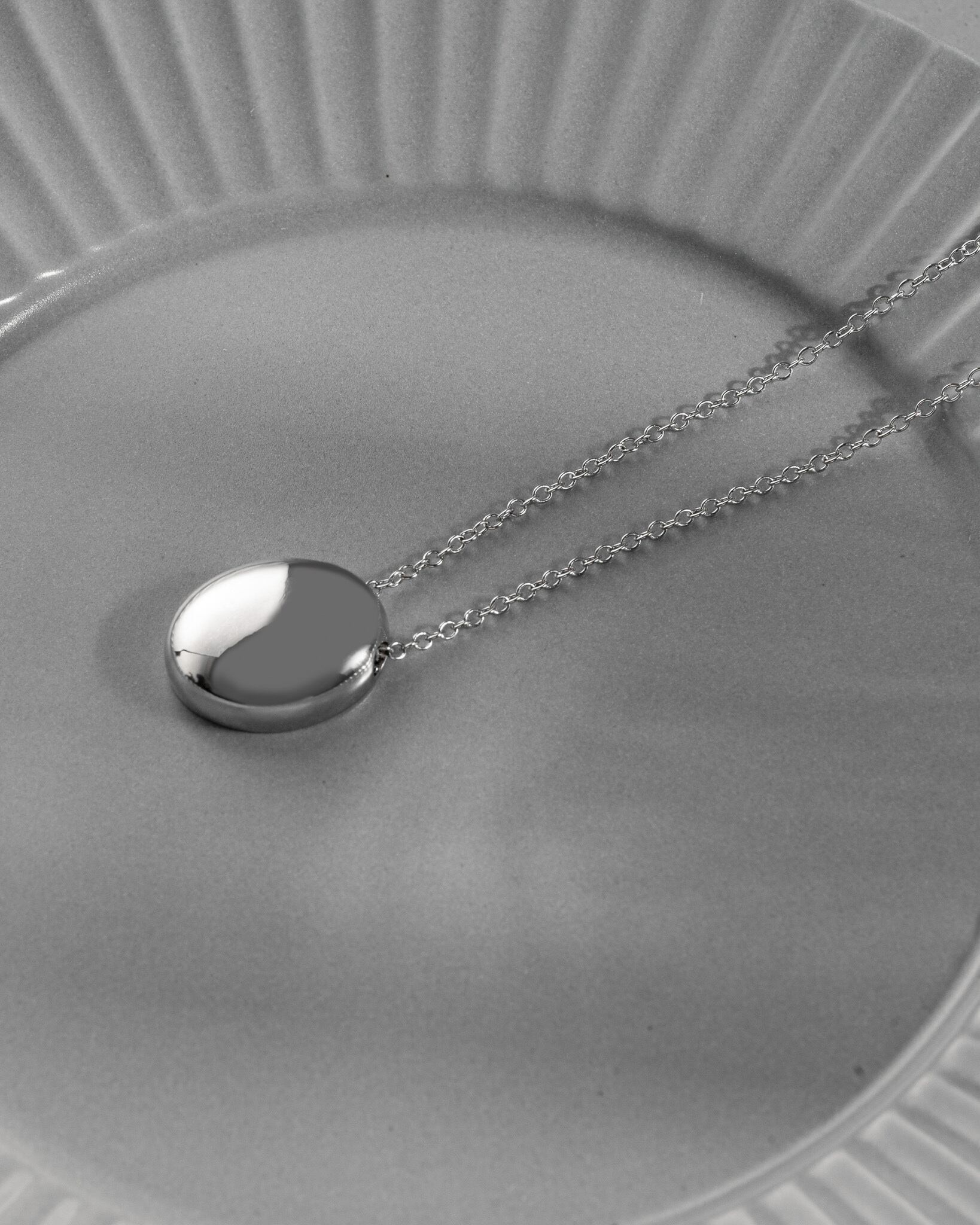 Oval metal pendant long necklace