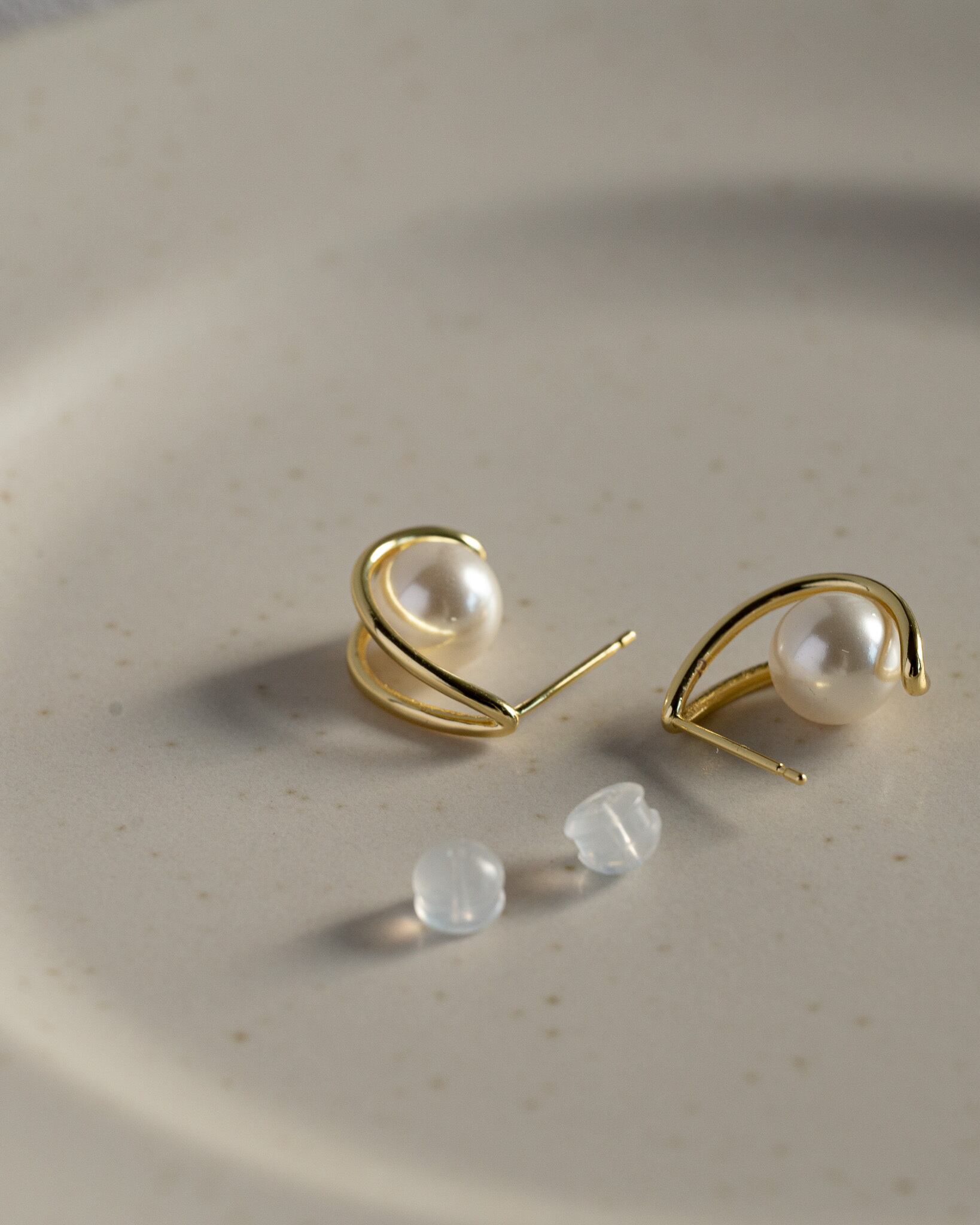 Double line pearl stud pierce
