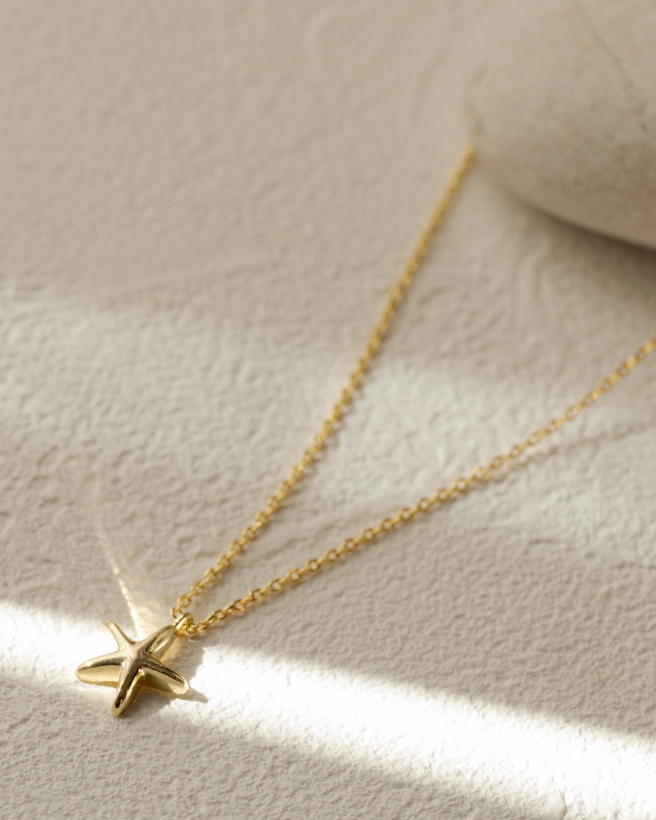 Starfish charm necklace