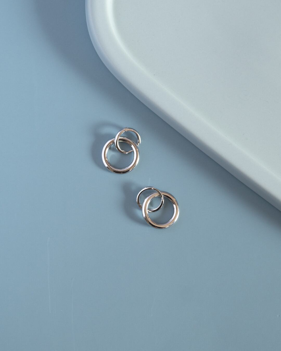 Double ring hoop pierce