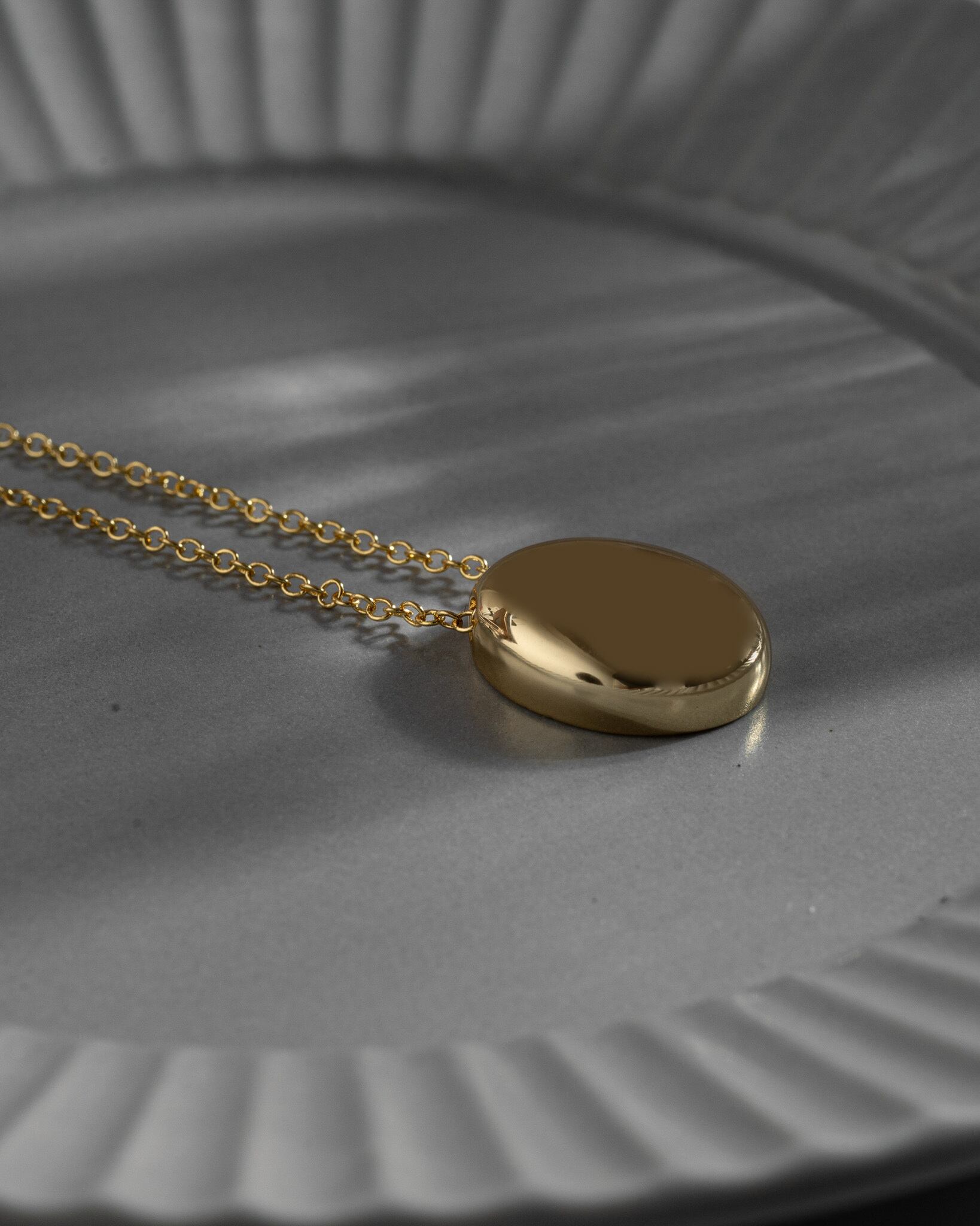 Oval metal pendant long necklace