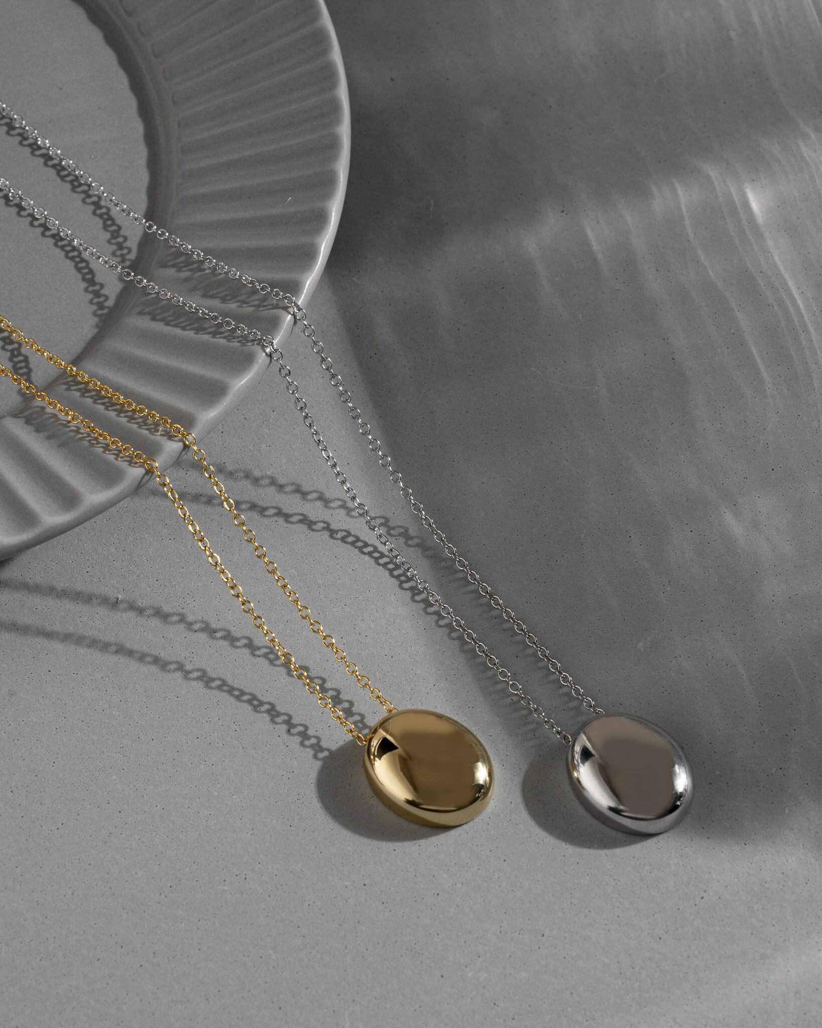 Oval metal pendant long necklace