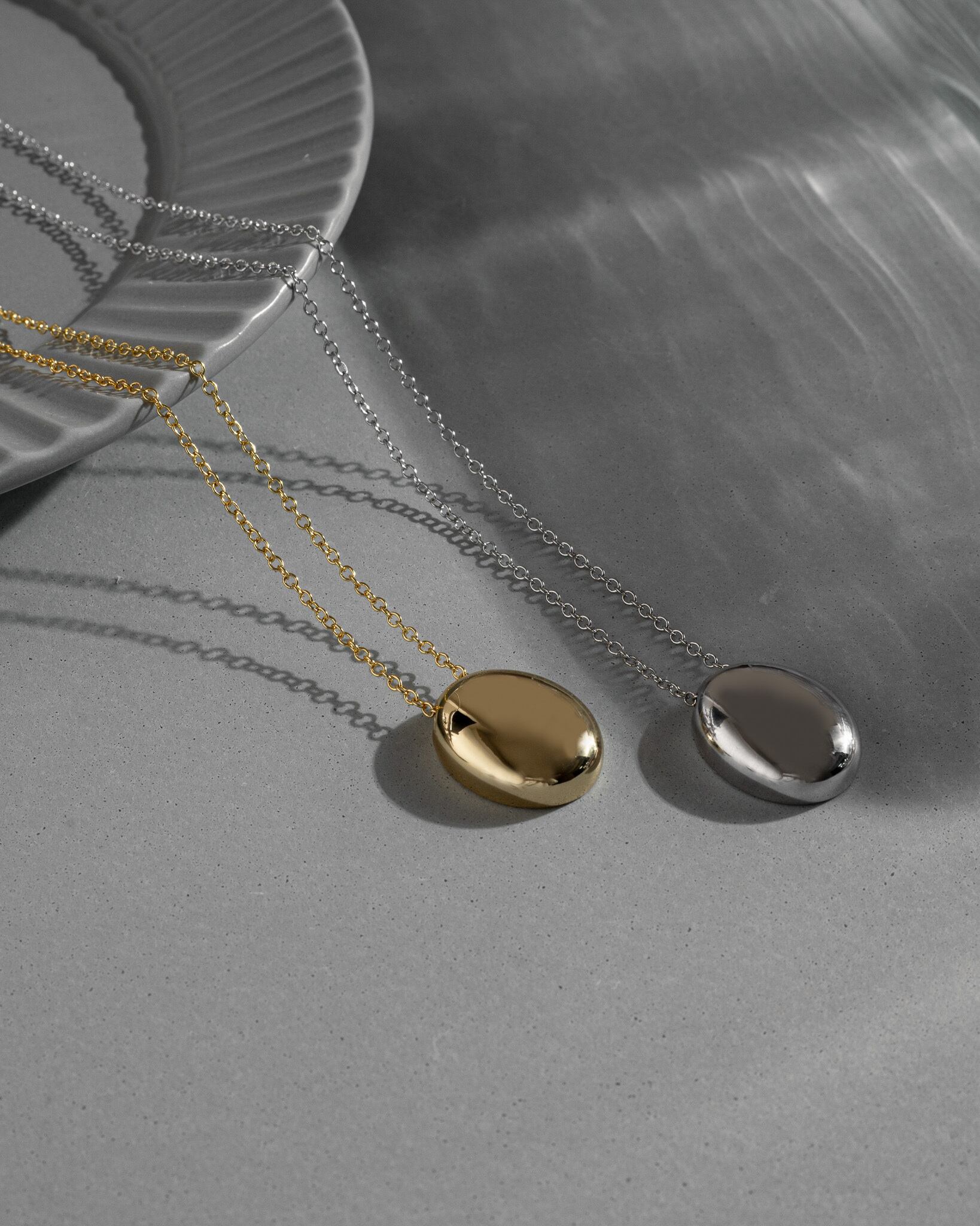 Oval metal pendant long necklace